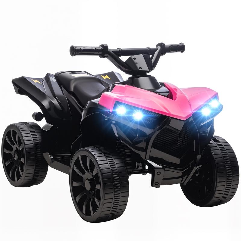 Quad eléctrico infantil en rosa y negro con los faros LED encendidos